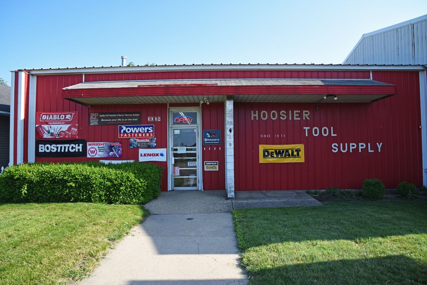 The Hoosier Tool Supply storefront entrance on West Sample Street in South Bend, Indiana